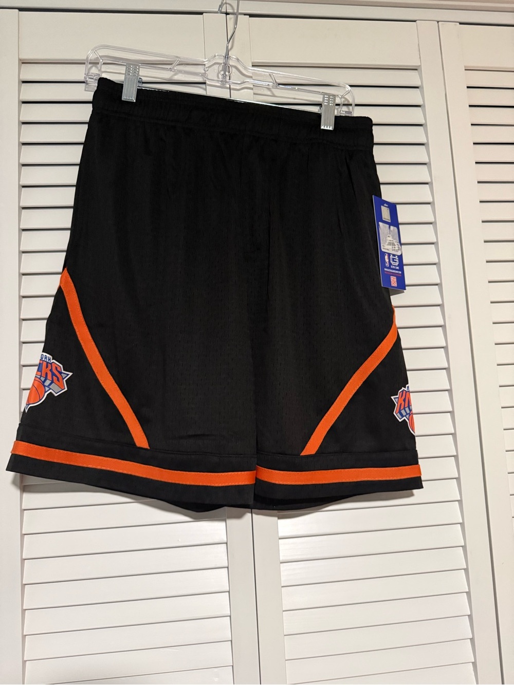 NBA Men’s Black Shorts with Orange Trim